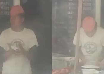 Chef spitting on rotis